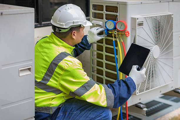 Professional Hvac technician working in Spring Grove, IL